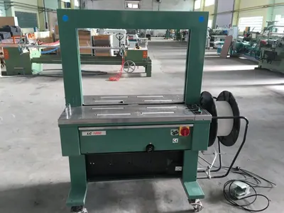 Automatinis PP juostos rišimo stalas SIGNODE LC 1000